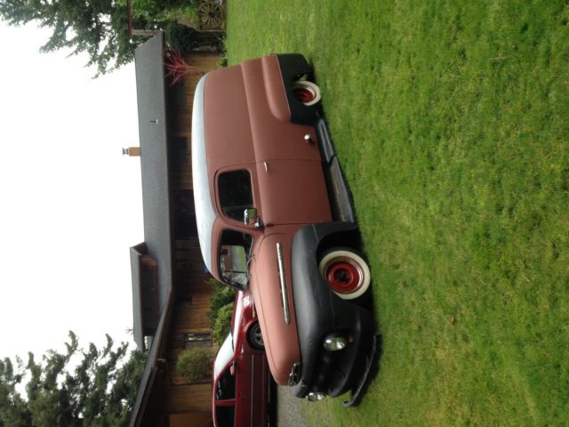 1951 Red and Black primer Ford F-100 panel