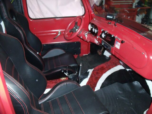 1951 black and red Ford F-100 Standard Cab Pickup