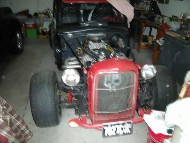 1951 black and red Ford F-100 Standard Cab Pickup