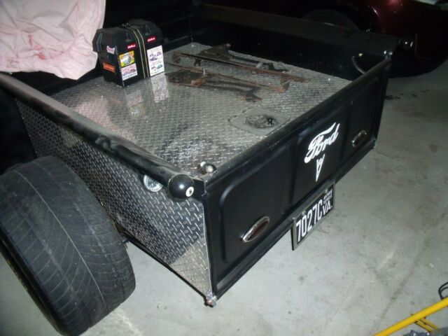 1951 black and red Ford F-100 Standard Cab Pickup