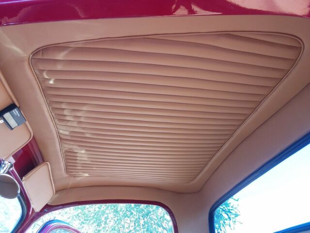 1951 Red Ford F-100 Standard Cab Pickup