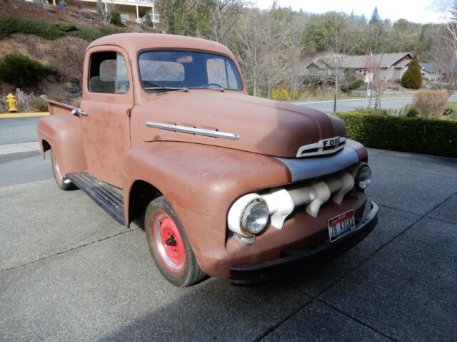 1951 Red Ford F-100 Standard Cab Pickup