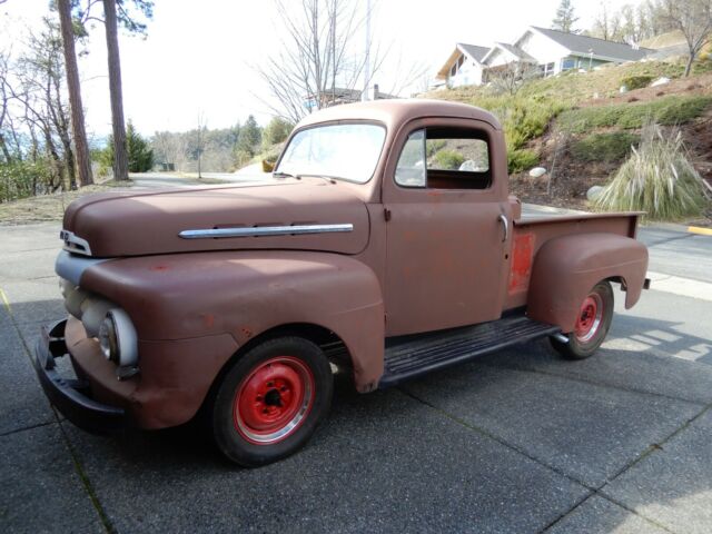 1951 Red Ford F-100 Standard Cab Pickup