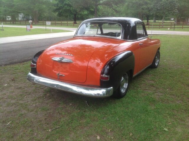 1951 Orange and Black Plymouth Voyager Coupe