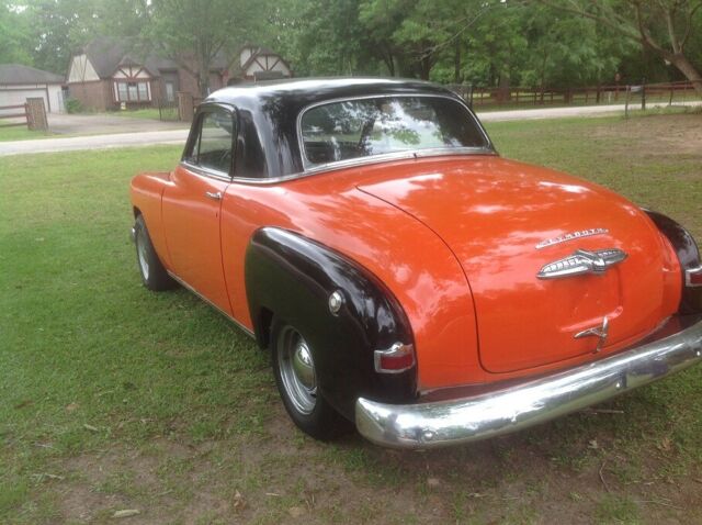 1951 Orange and Black Plymouth Voyager Coupe
