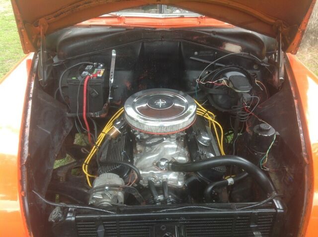 1951 Orange and Black Plymouth Voyager Coupe