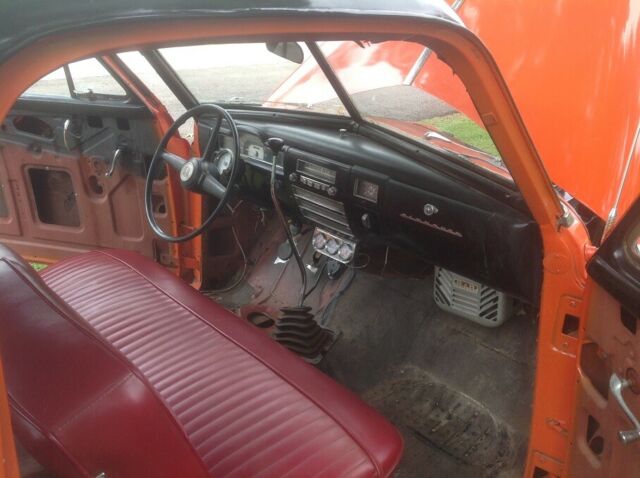 1951 Orange and Black Plymouth Voyager Coupe