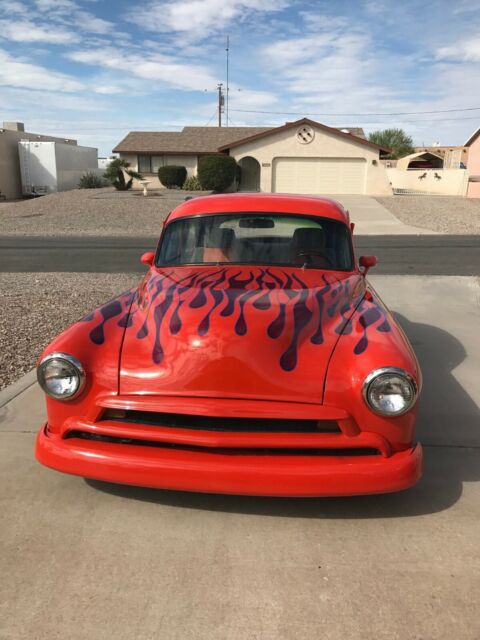 1954 Orange Chevrolet 350ci with air Sedan