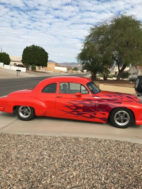 1954 Orange Chevrolet 350ci with air Sedan