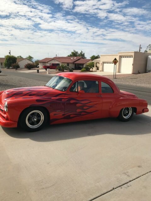 1954 Orange Chevrolet 350ci with air Sedan
