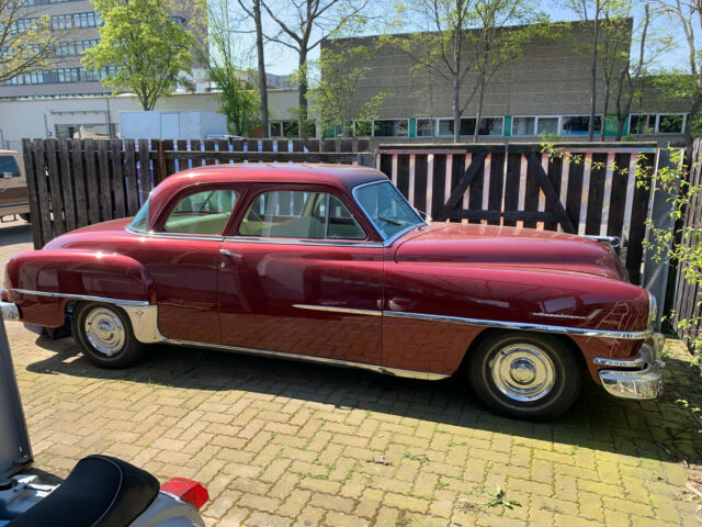 1952 Burgundy metallic Chrysler Saratoga Coupe