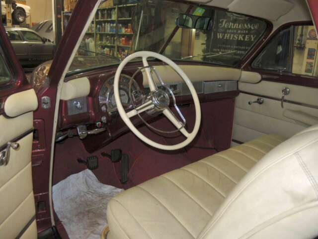 1952 Burgundy metallic Chrysler Saratoga Coupe