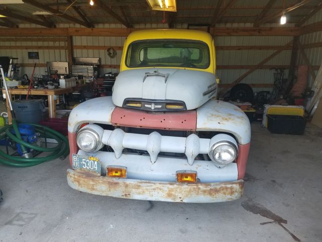 1952 Yellow and primer Ford F-100 Coupe
