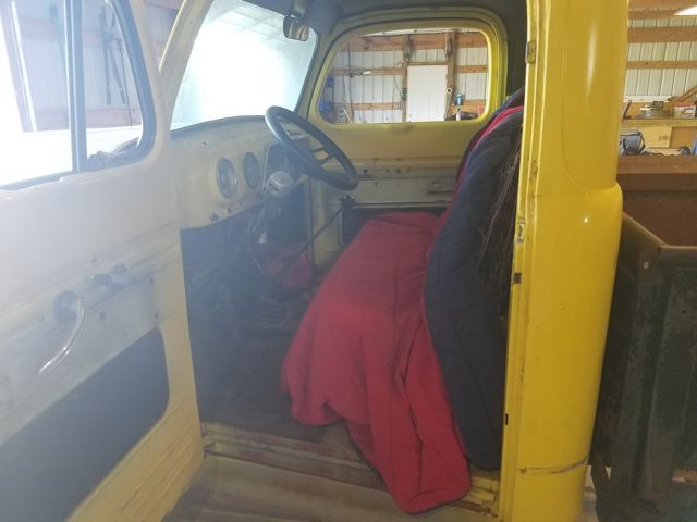 1952 Yellow and primer Ford F-100 Coupe