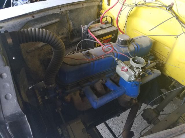 1952 Yellow and primer Ford F-100 Coupe