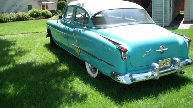 1952 White/Blue Oldsmobile Eighty-Eight Sedan