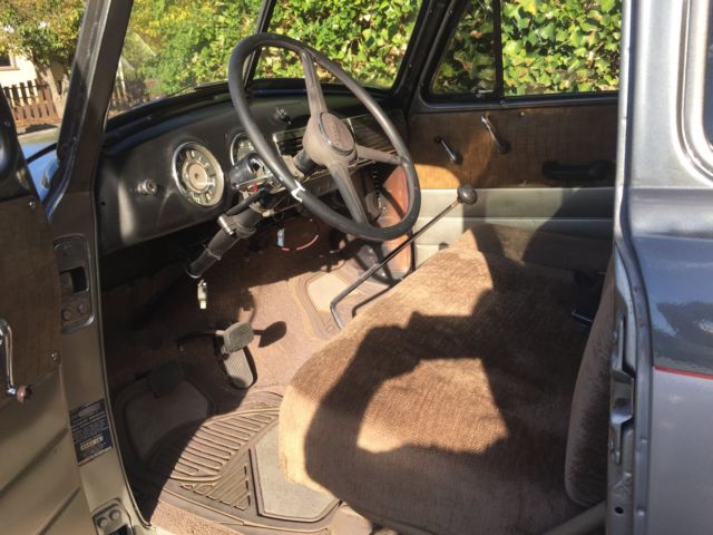 1953 Grey and silver Chevrolet Suburban SUV
