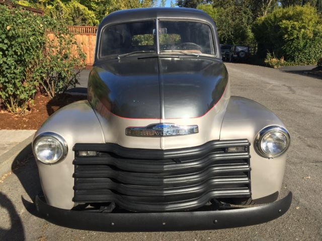 1953 Grey and silver Chevrolet Suburban SUV