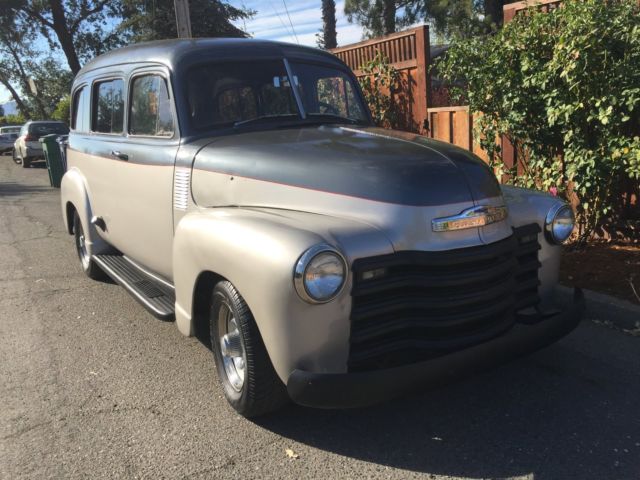 1953 Grey and silver Chevrolet Suburban SUV