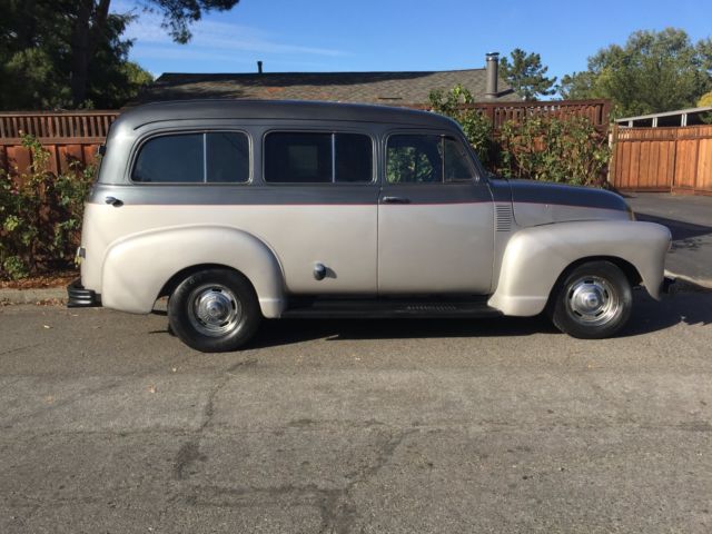 1953 Grey and silver Chevrolet Suburban SUV
