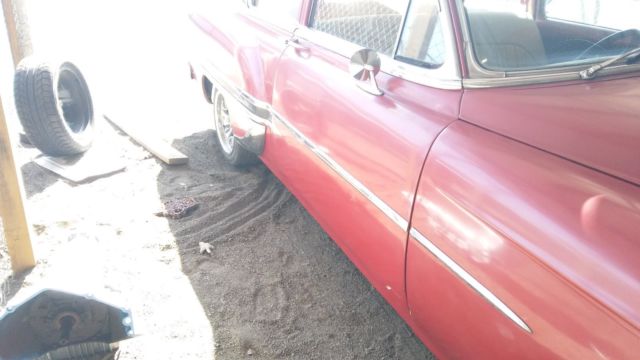 1954 red Chevrolet Bel Air/150/210 2 door post