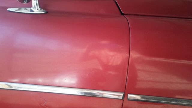 1954 red Chevrolet Bel Air/150/210 2 door post