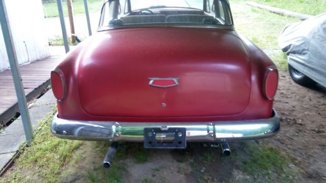 1954 red Chevrolet Bel Air/150/210 2 door post