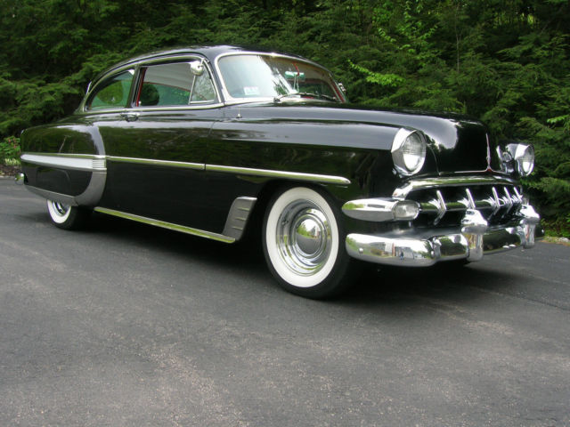 1954 yellow & white Chevrolet Bel Air/150/210 Sedan