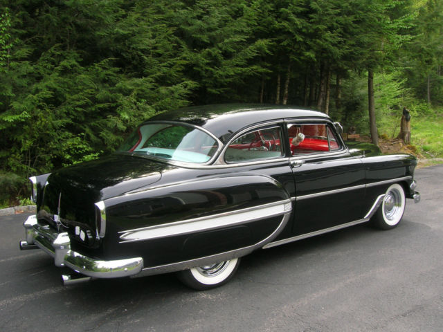 1954 yellow & white Chevrolet Bel Air/150/210 Sedan