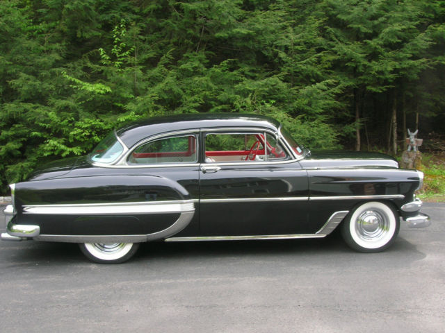1954 yellow & white Chevrolet Bel Air/150/210 Sedan