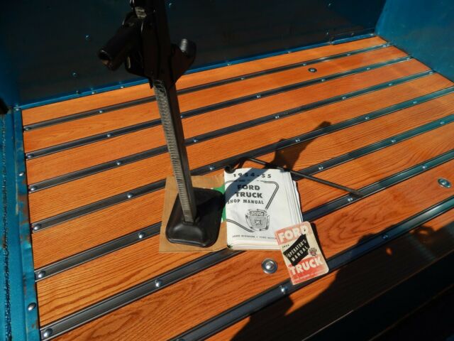 1954 blue black Ford F-100 truck