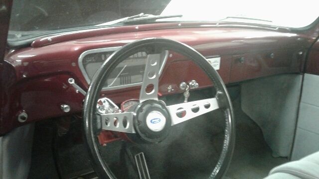 1954 Maroon with chrome wheels Ford F-100 Short Wheel Base