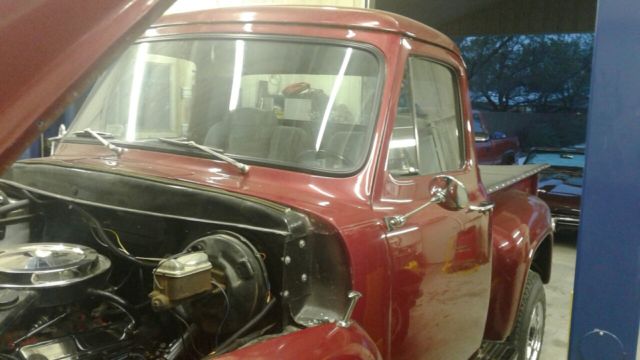 1954 Maroon with chrome wheels Ford F-100 Short Wheel Base