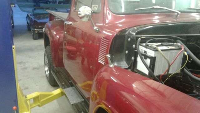 1954 Maroon with chrome wheels Ford F-100 Short Wheel Base