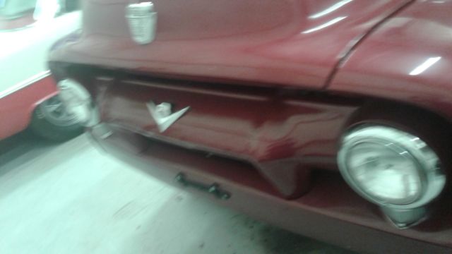 1954 Maroon with chrome wheels Ford F-100 Short Wheel Base