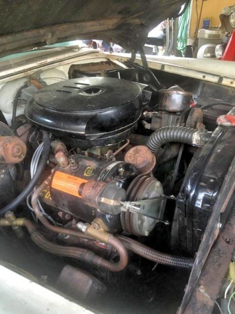 1954 blue and white Oldsmobile Ninety-Eight Coupe