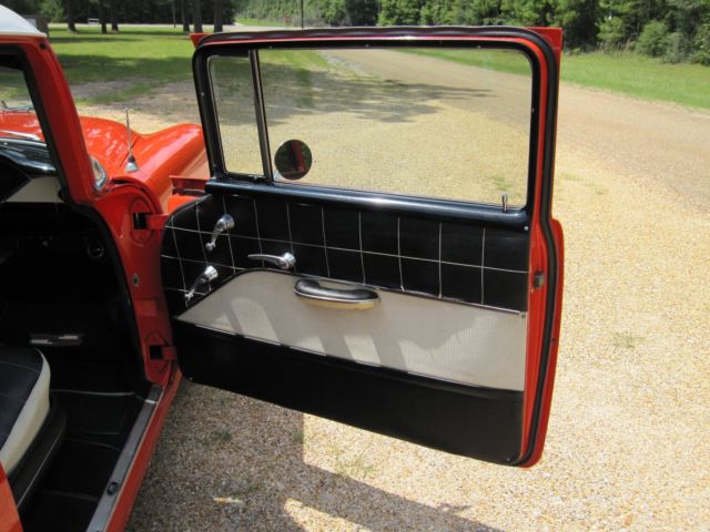 1955 Gypsy Red/India Ivory Chevrolet Bel Air/150/210 Sedan