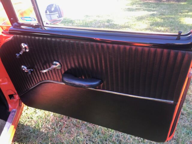 1955 Orange Chevrolet Bel Air/150/210 Sedan