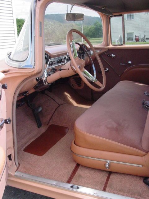 1955 coral and white Chevrolet Bel Air/150/210 Sedan