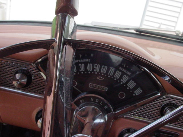 1955 coral and white Chevrolet Bel Air/150/210 Sedan