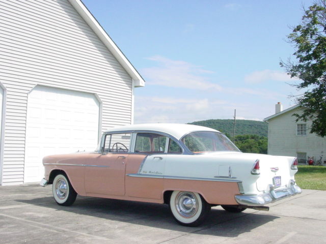 1955 coral and white Chevrolet Bel Air/150/210 Sedan