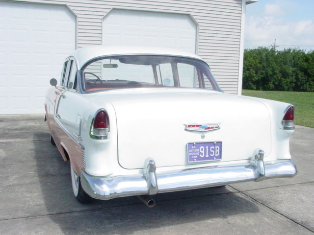 1955 coral and white Chevrolet Bel Air/150/210 Sedan