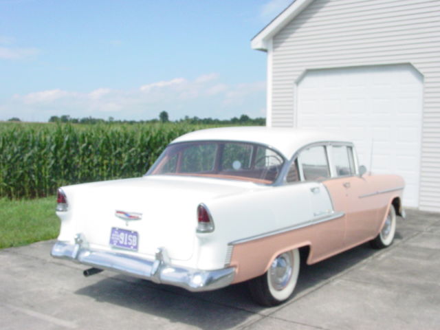 1955 coral and white Chevrolet Bel Air/150/210 Sedan