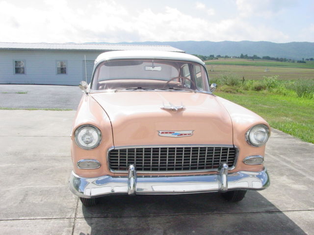 1955 coral and white Chevrolet Bel Air/150/210 Sedan