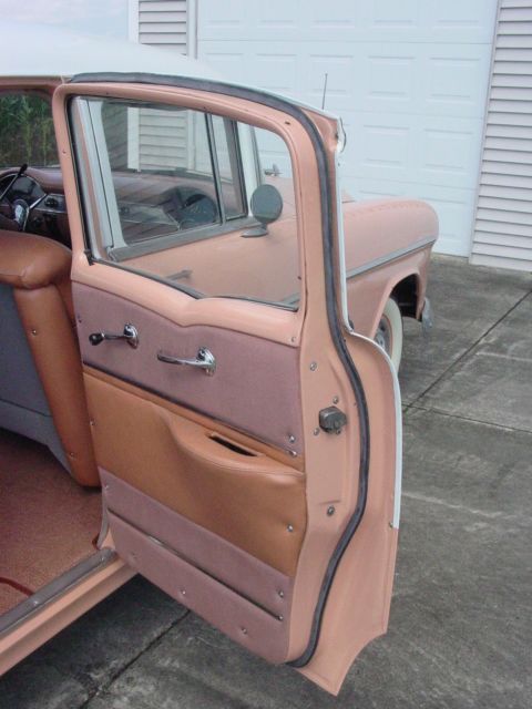 1955 coral and white Chevrolet Bel Air/150/210 Sedan
