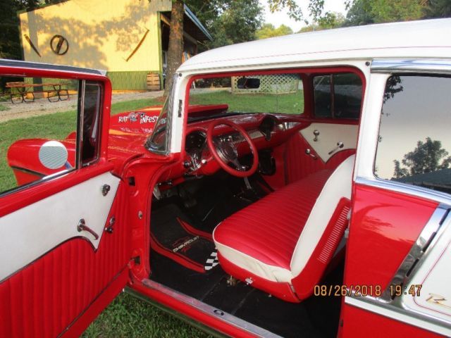1955 RED AND WHITE Chevrolet Bel Air/150/210 Coupe