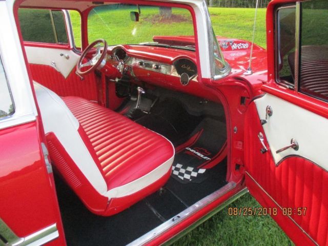 1955 RED AND WHITE Chevrolet Bel Air/150/210 Coupe