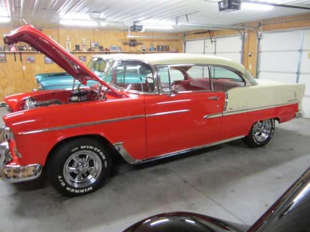 1955 red  and white Chevrolet Bel Air/150/210 Coupe