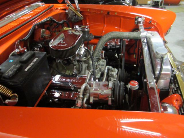 1955 red  and white Chevrolet Bel Air/150/210 Coupe
