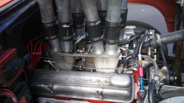 1955 orange Chevrolet Bel Air/150/210 Coupe
